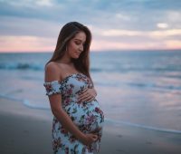 pregnant woman in seashore
